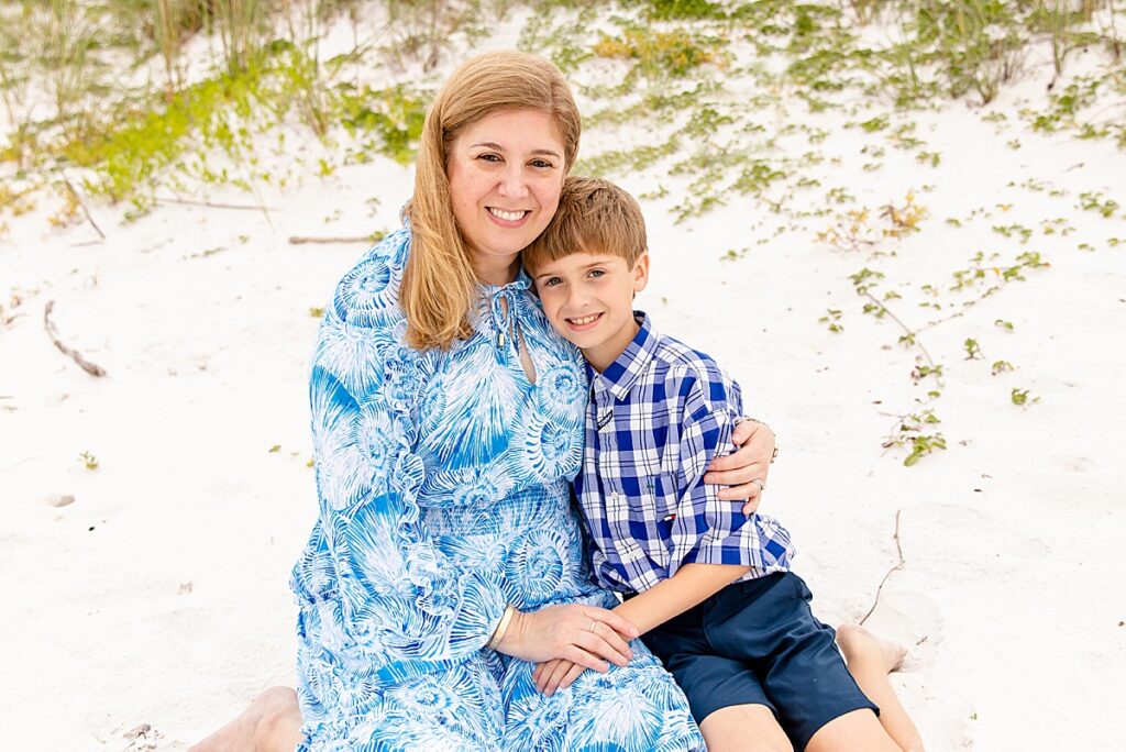 mom and son during family session on pensacola beach